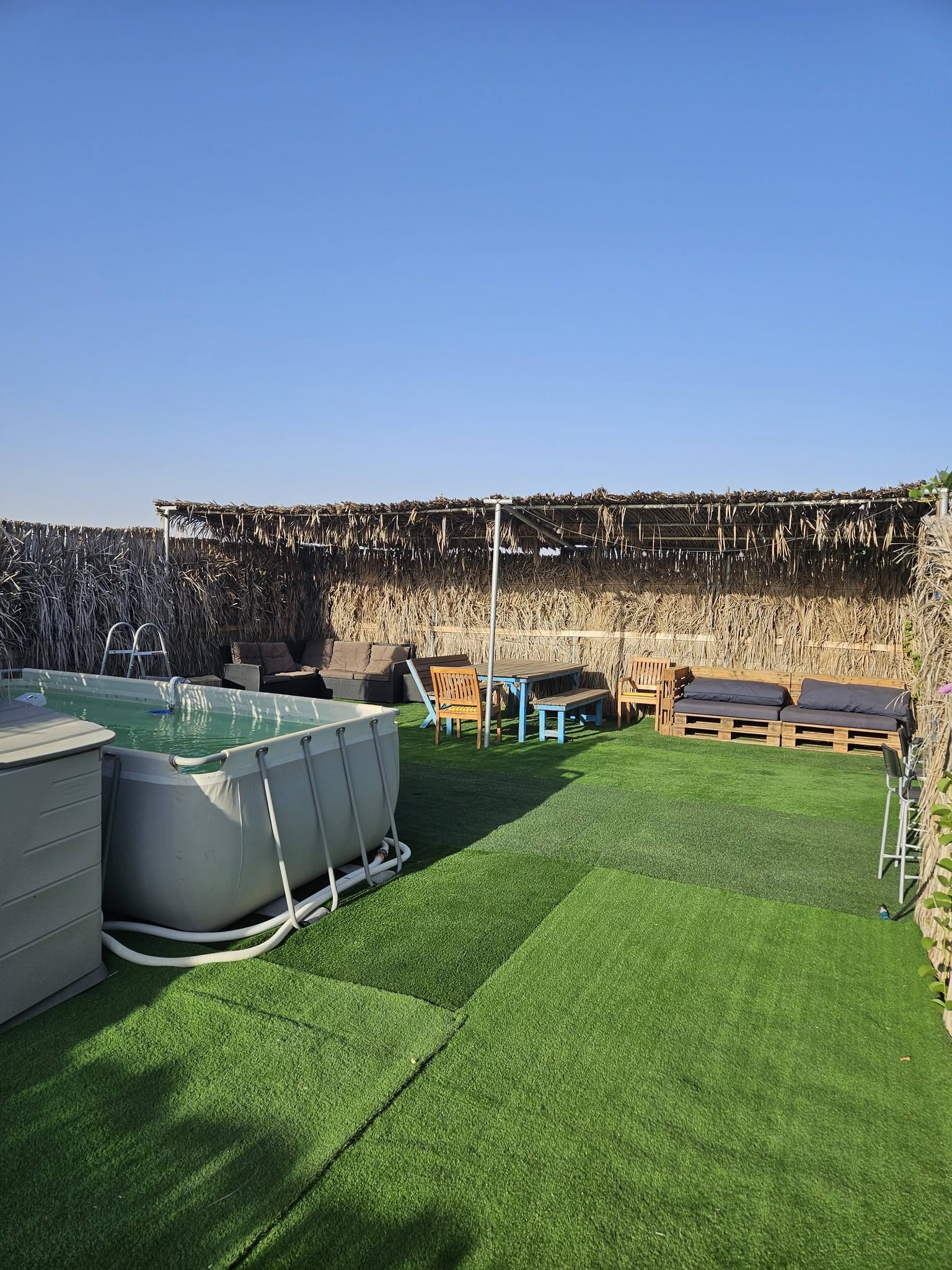 Shaded pool and seating area