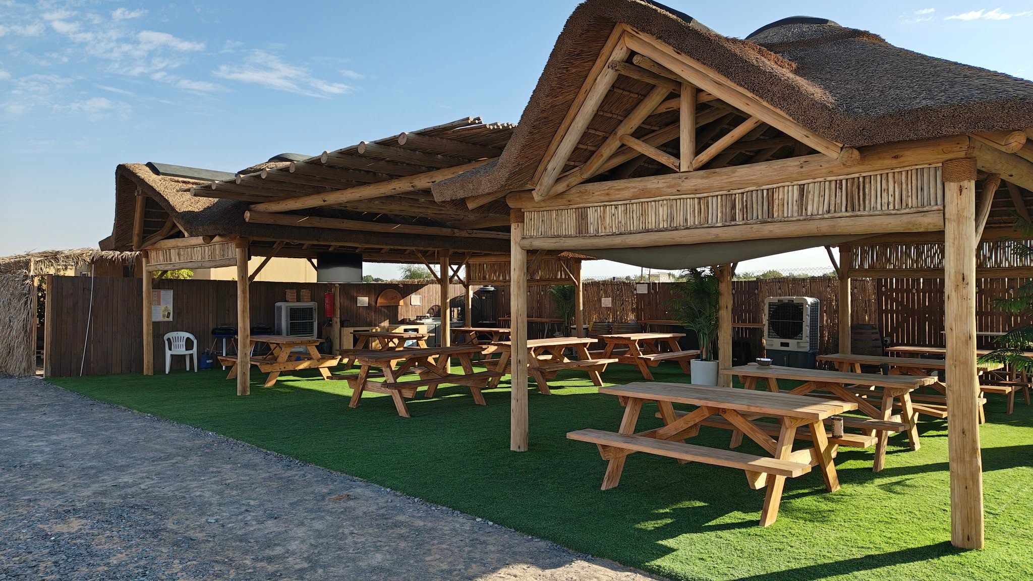 Picnic tables under the lapa