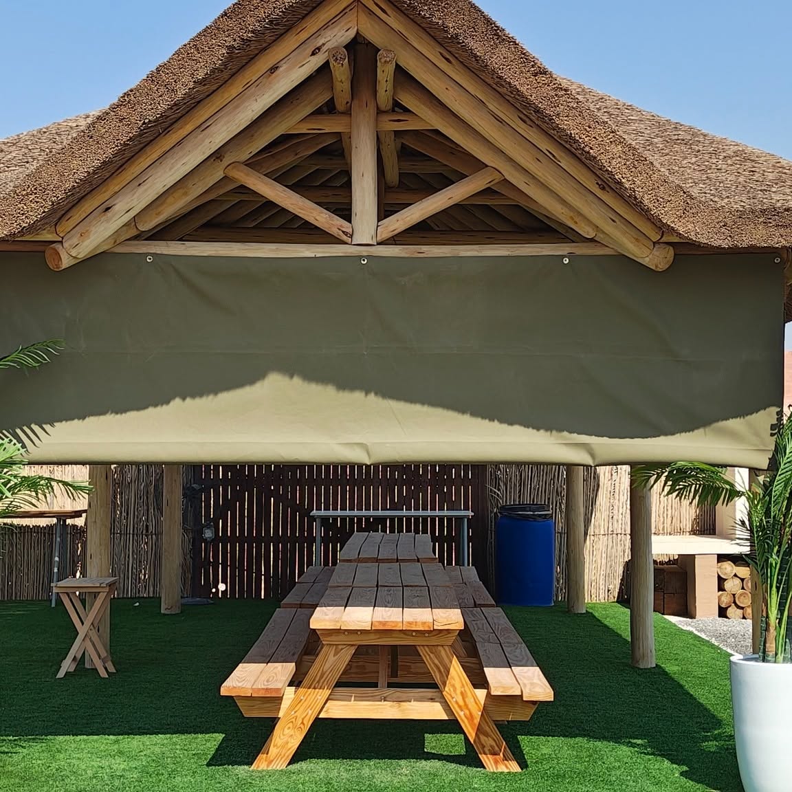 Shade sail and picnic table